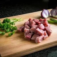 Diced Cornish Heritage Pork Gammon from Primrose Herd, 500g, showing tender, cubed pork meat suitable for cooking.
