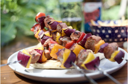 Diced Primrose Herd pork cubes ideal for kebabs, showing fresh, evenly cut pork pieces in a close-up image.