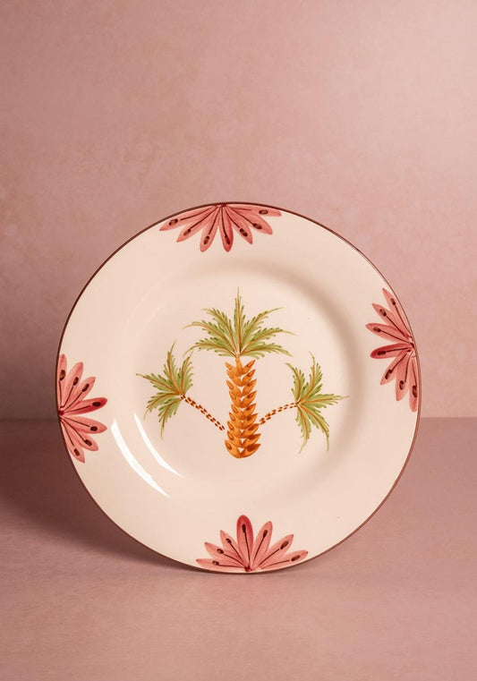 Set of four Casa Arabella dinner plates featuring green palm tree design, perfect for stylish table settings.