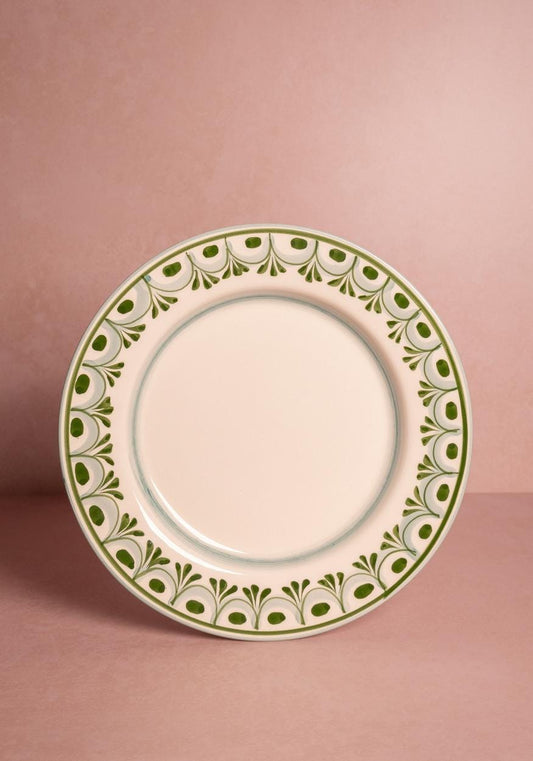 Set of four green Cordelia dinner plates by Casa by Josephine Jenno, showcasing smooth ceramic surface and elegant design.