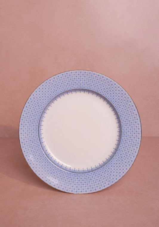 Set of four Casa by Josephine Jenno Cornflower Blue Lace Dinner Plates with intricate lace pattern on ceramic surface.