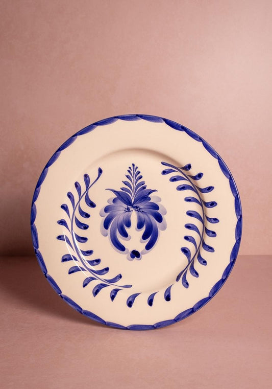 Set of four Pandora dinner plates by Casa in vibrant cobalt blue, showcasing elegant round ceramic design.