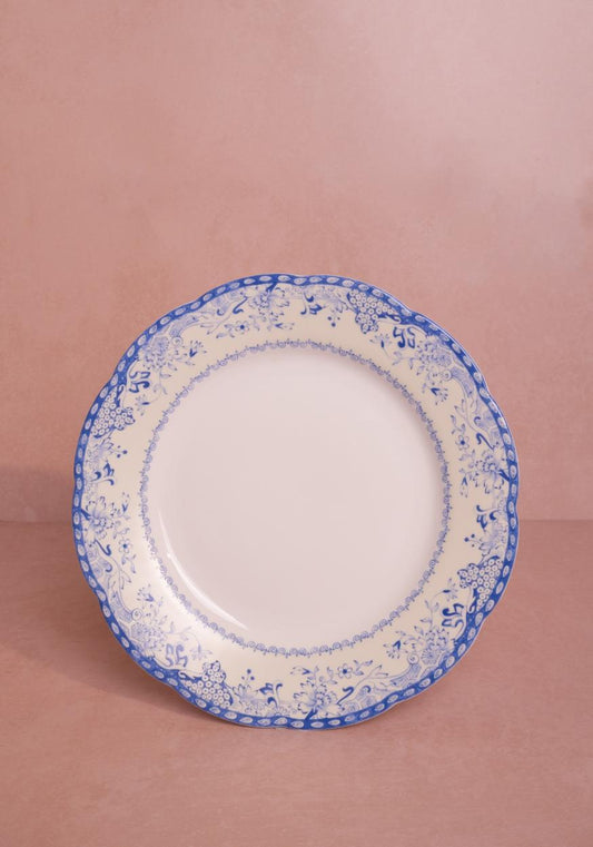 Set of four Virginia Blue and White dinner plates by Casa, featuring intricate blue patterns on white ceramic.