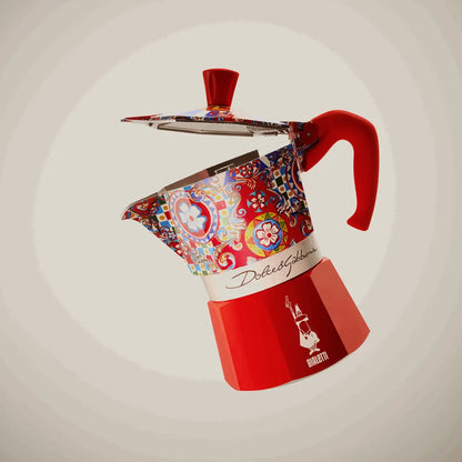 Bialetti X Dolce&Gabbana Sicilian Cart Moka Express coffee maker with intricate Dolce&Gabbana design and 3-cup Bialetti hardware.