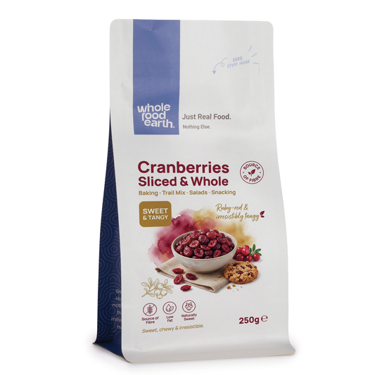 Sliced and whole cranberries from ArtisanBox, fresh and vibrant red berries for cooking or snacking.