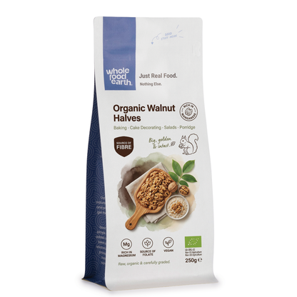 Organic walnut halves in a bowl, showcasing their natural, crunchy texture, from Whole Food Earth Nuts & Seeds collection.