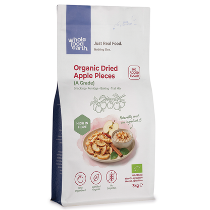 Organic dried apple pieces from Whole Food Earth, high-quality dried fruit with natural color and texture, suitable for snacks or baking.