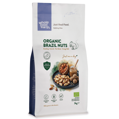Organic Brazil nuts from Whole Food Earth, whole and shelled, in a natural pile, showcasing their rich brown color and large size.