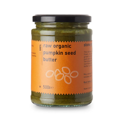 Creamy raw organic pumpkin seed butter from Whole Food Earth, ideal for dips and spreads, shown in a jar with a smooth texture.