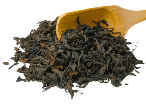 Black tea leaves of Emperor Butterfly Lapsang Souchong by Porter Hill Tea Company, shown in a transparent container.