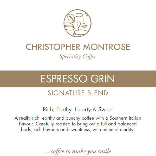 Close-up of Christopher Montrose Coffee Espresso Grin Arabica Coffee Beans label on a bag, showcasing branding and product details.
