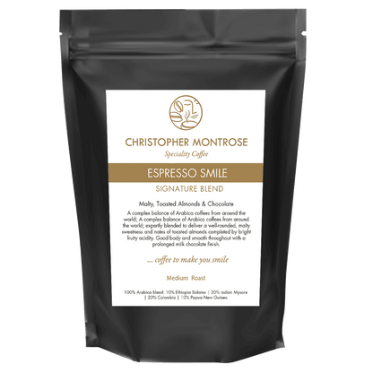 Transparent image of Christopher Montrose Coffee Arabica Espresso Smile coffee beans with a rich, roasted appearance.