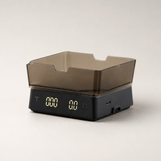KNOCDIC® Mini Coffee Scale with Timer showing a digital display and espresso cups for precise coffee measurement.