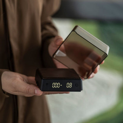KNOCDIC® Mini Coffee Scale with Timer showing espresso measurement on digital display, compact design for precise brewing.
