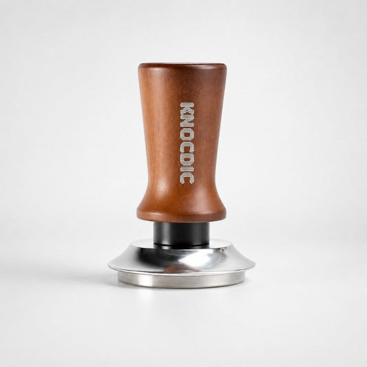 KNOCDIC® espresso tamper with spring-loaded base for even coffee tamping in barista-quality espresso shots.