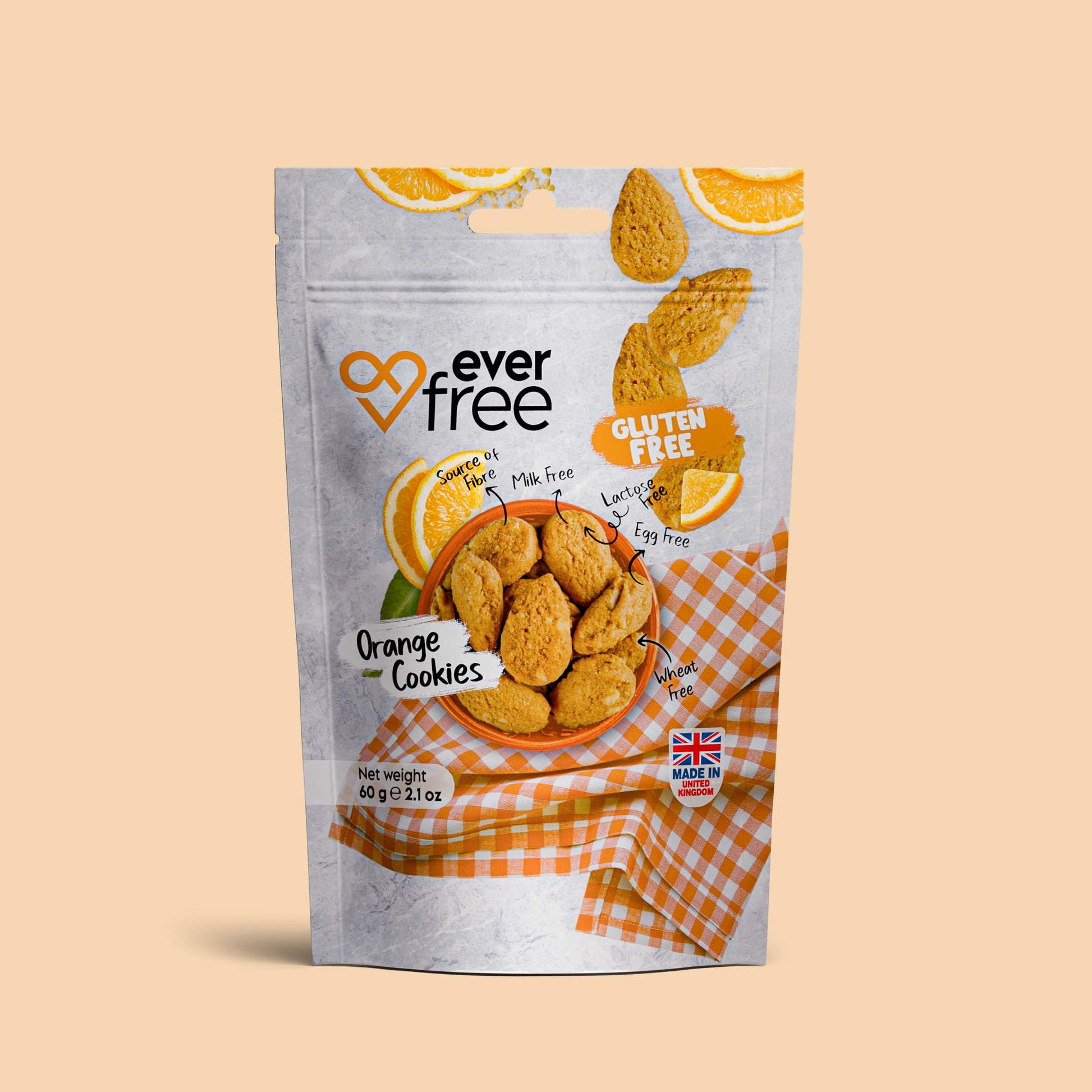 Three packs of EverFree gluten-free orange cookies, 60g each, with bright packaging and orange-flavored cookies visible.