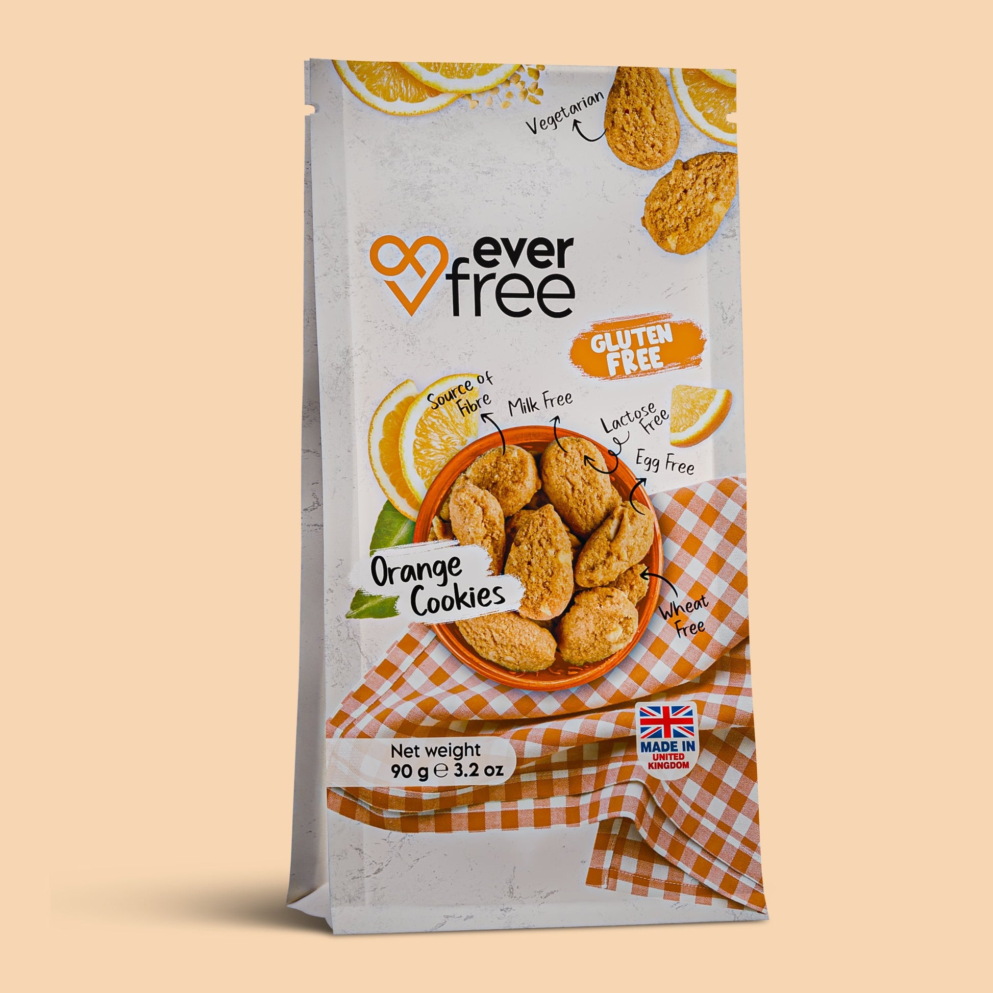 Three gluten-free orange cookies from EverFree in a clear packaging, showcasing the bright orange flavor and cookie texture.