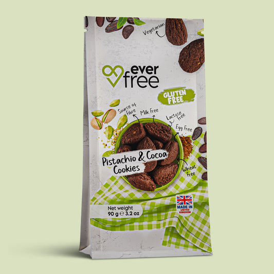 Three gluten-free pistachio and cocoa cookies by EverFree shown in their packaging on a white background.