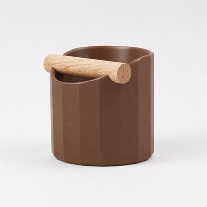 KNOCDIC® Facet Geometric Espresso Knock Box with brown finish and oak knock bar for coffee machine maintenance.