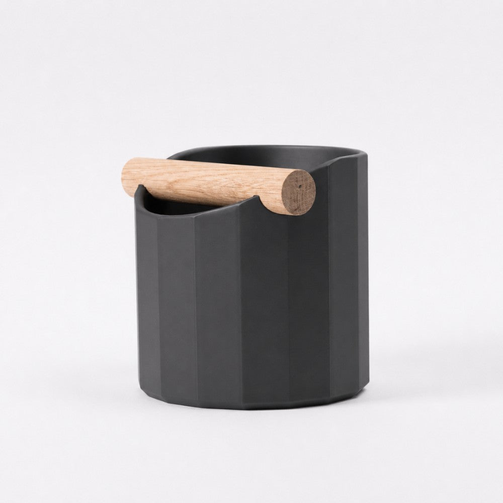 KNOCDIC® Facet Geometric Espresso Knock Box with charcoal finish and oak knock bar for coffee espresso machine cleanup.