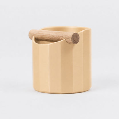 KNOCDIC Facet Geometric Espresso Knock Box with Desert Tan finish and oak knock bar for coffee tool storage and espresso shot prep