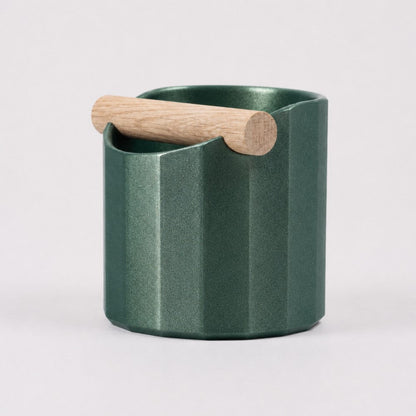 KNOCDIC® Facet Geometric Espresso Knock Box with galaxy green finish and oak knock bar for coffee espresso machine cleanup.