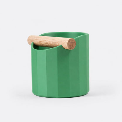 KNOCDIC Facet Geometric Espresso Knock Box in grass green with oak knock bar for coffee puck disposal.