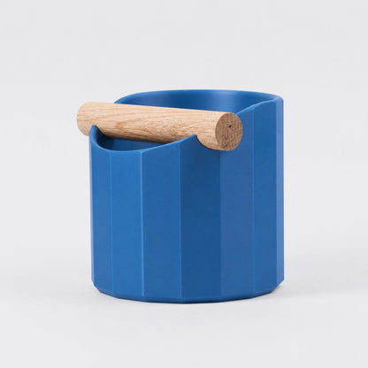 KNOCDIC Facet Geometric Espresso Knock Box in marine blue with oak knock bar for coffee machine espresso shot cleanup.