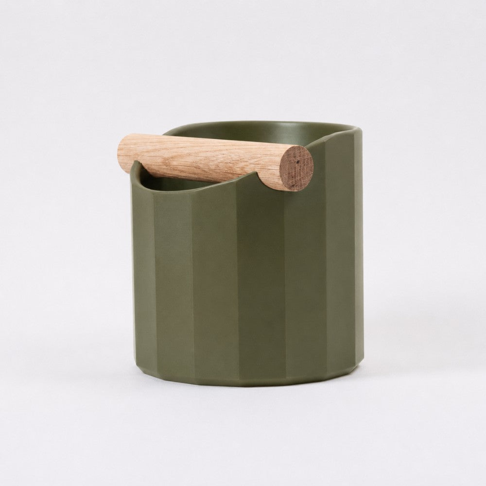 KNOCDIC® Facet Geometric Espresso Knock Box in olive green with oak knock bar for coffee machine accessories.