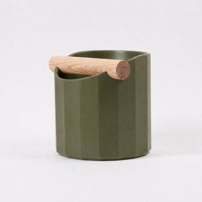 KNOCDIC® Facet Geometric Espresso Knock Box in olive green with oak knock bar for coffee machine accessories.