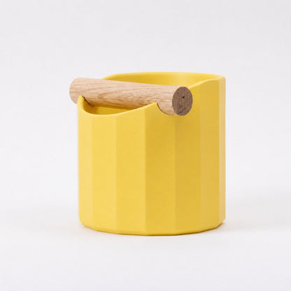 Yellow Facet Geometric Espresso Knock Box with Oak Knock Bar by KNOCDIC® for coffee espresso machine cleaning.