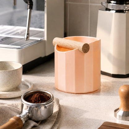 KNOCDIC Facet Geometric Espresso Knock Box with Oak Knock Bar on kitchen countertop for coffee espresso preparation.
