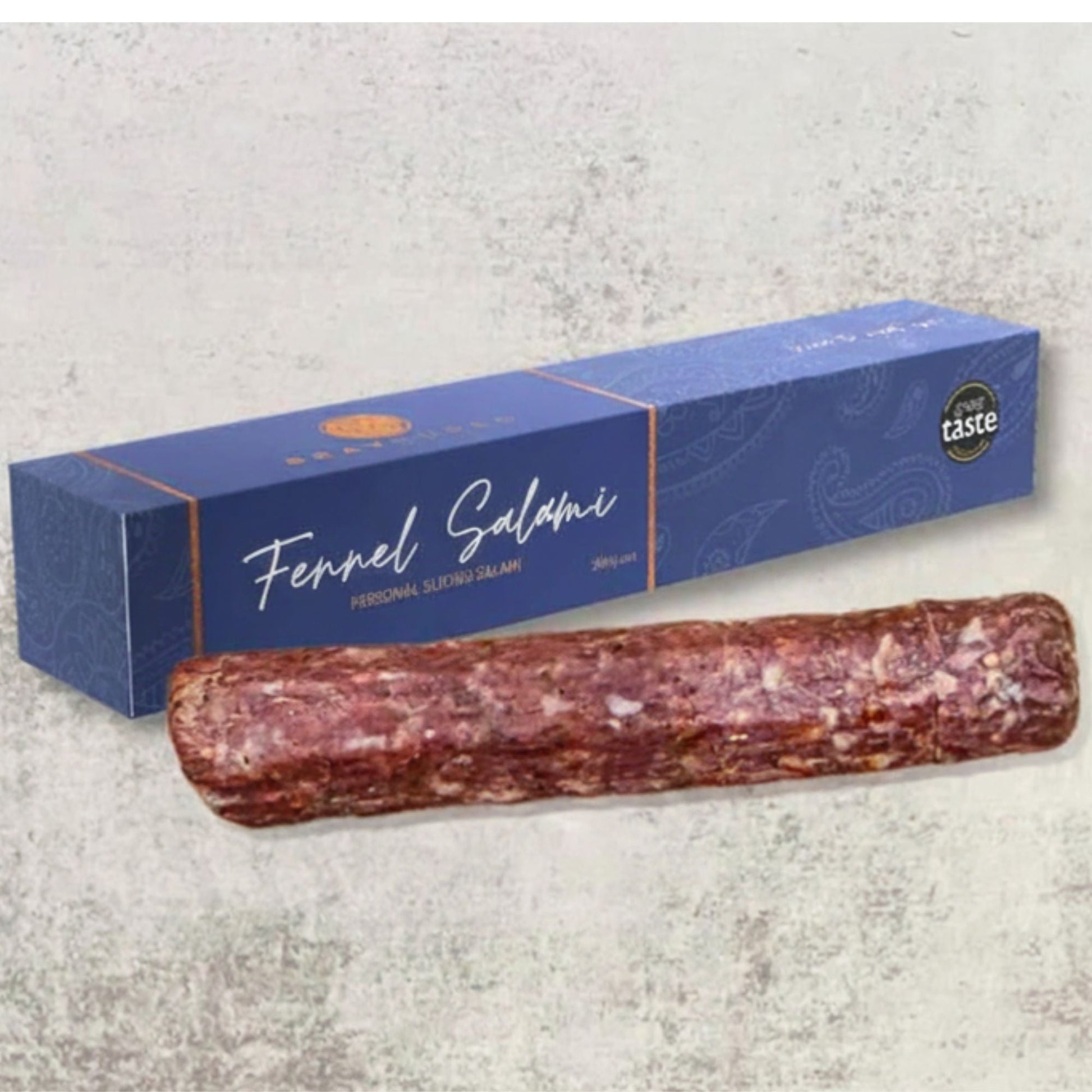 Thinly sliced Bray Cured personal slicing salami with fennel, displayed on a wooden board as part of a charcuterie selection.