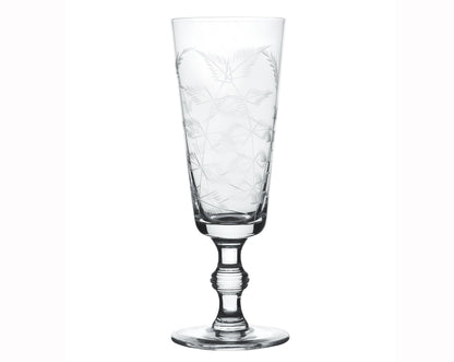 A Set of Four Crystal Champagne Flutes with Fern Design