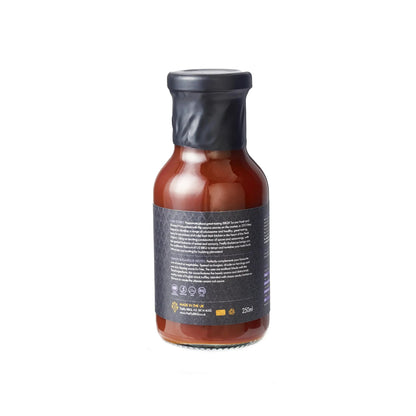 Bottle of FireFly Barbecue Black Truffle BBQ Sauce with a sleek label, showcasing its rich, dark color and luxurious truffle flavor.