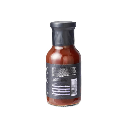 FireFly Barbecue black truffle BBQ sauce in a jar with rich, dark sauce and truffle pieces visible inside.