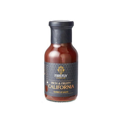 FireFly Barbecue California Apple BBQ Sauce in a squeeze bottle, showcasing its rich, glossy sauce texture.