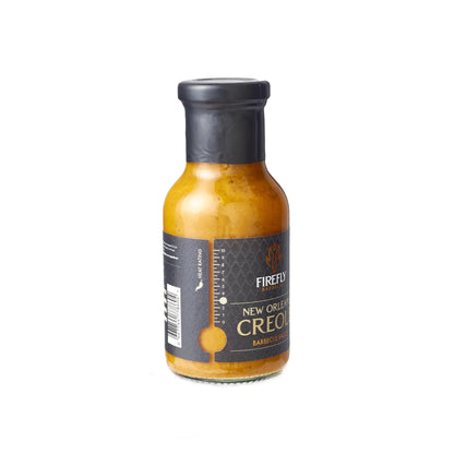 FireFly Barbecue New Orleans Creole Sauce bottle, spicy BBQ sauce with bold creole flavors, in a glass jar.