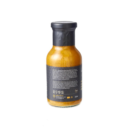 FireFly Barbecue New Orleans Creole Sauce, a rich and flavorful BBQ sauce with creole spices, in a bottle showing the label.
