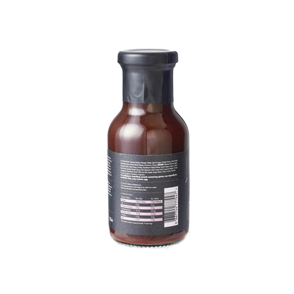 Bottle of FireFly Barbecue Sweet Texas BBQ Sauce, rich and flavorful BBQ sauce in a clear glass bottle with a red cap.