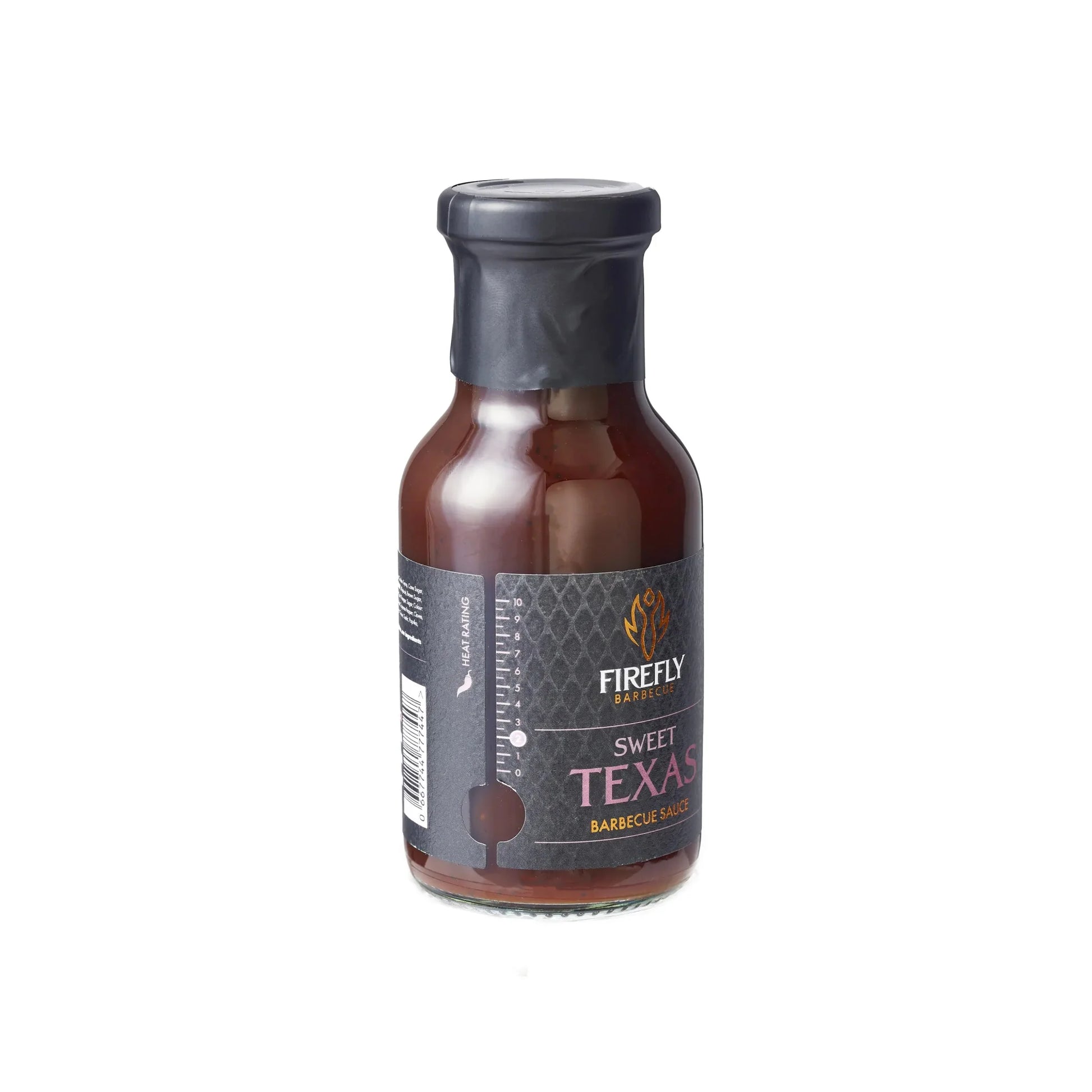 Bottle of FireFly Barbecue Sweet Texas BBQ Sauce showing the label and dark, rich sauce inside the bottle.