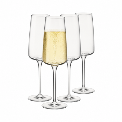 Set of four Bormioli Rocco Planeo champagne flutes filled with champagne, showcasing elegant glassware for celebrations.