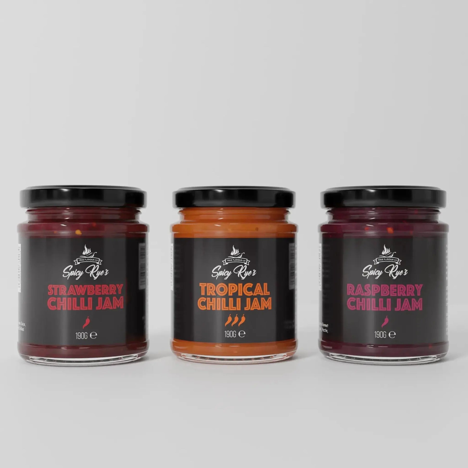 Spicy Ryes Fruity Chilli Jam Trio Gift Set featuring three jars of colorful, fruit-infused chilli jams in a gift box.