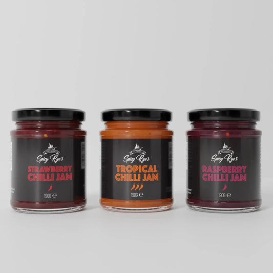 Spicy Ryes Fruity Chilli Jam Trio Gift Set featuring three jars of colorful, fruit-infused chilli jams in a gift box.