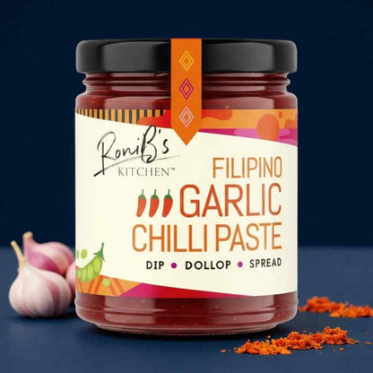 RoniBs Kitchen Filipino garlic chilli paste with garlic, Scotch bonnets, and chili powder in a jar, medium heat vegan hot sauce.