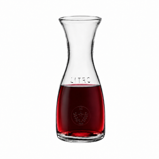 Bormioli Rocco Misura glass carafe filled with red wine, 1.1L capacity, elegant jug for serving beverages.