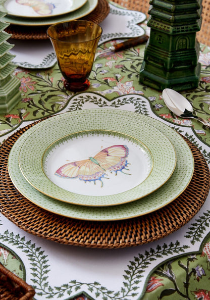 Set of four Casa by Josephine Jenno green apple lace dessert plates with butterfly side and pudding designs.
