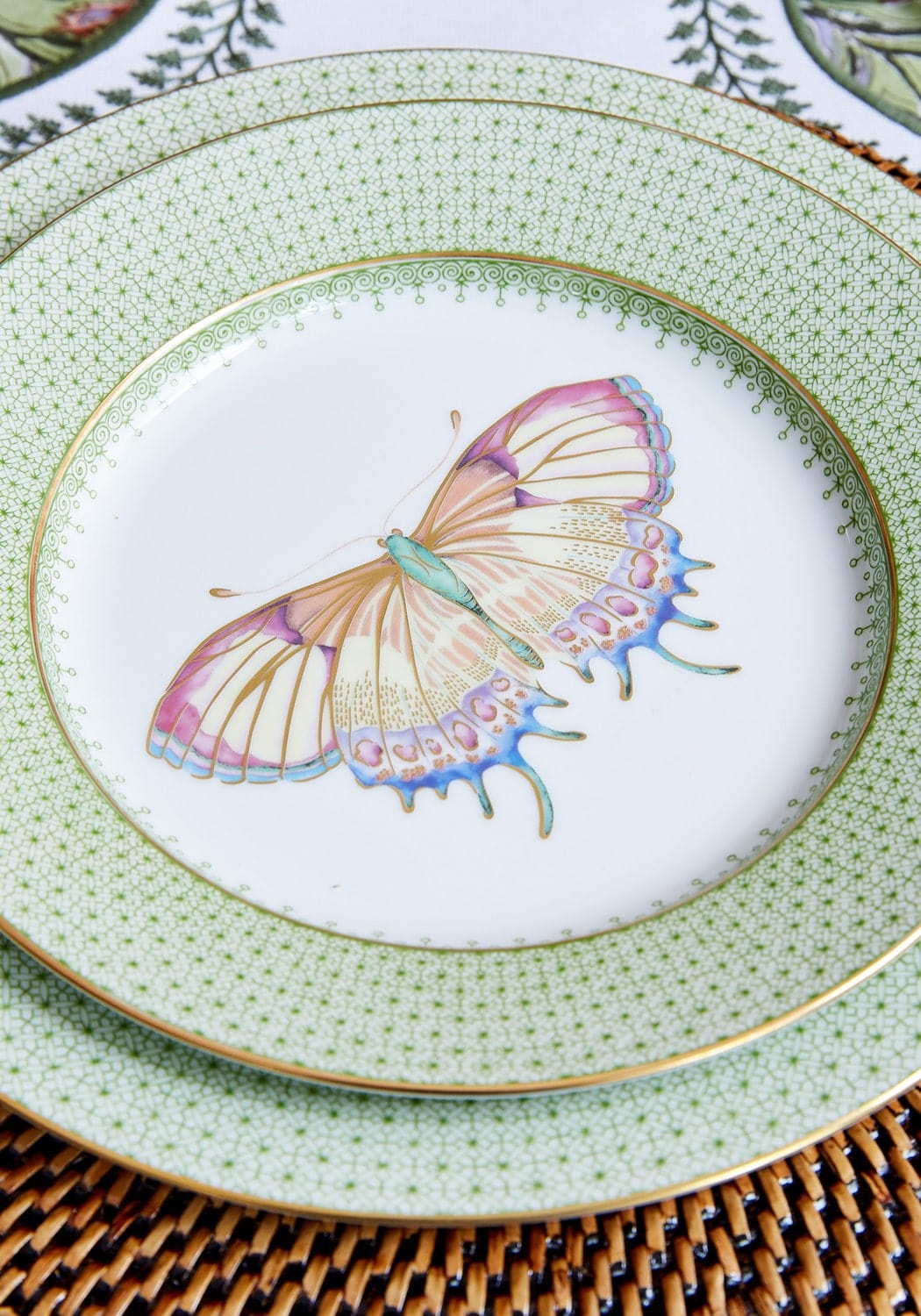 Set of four Casa by Josephine Jenno green apple lace dessert plates with butterfly side and pudding design.