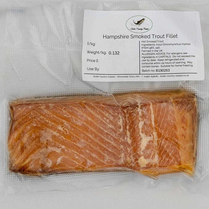 Smoked trout fillets from Hampshire by Butler Country Estates, arranged on a platter ready for serving.