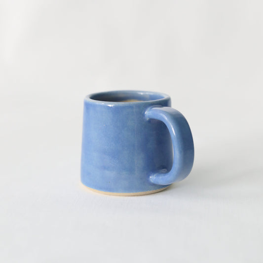 Handmade Pacific Blue ceramic espresso mug by Katie L Thompson Designs, featuring a classic design and smooth finish.
